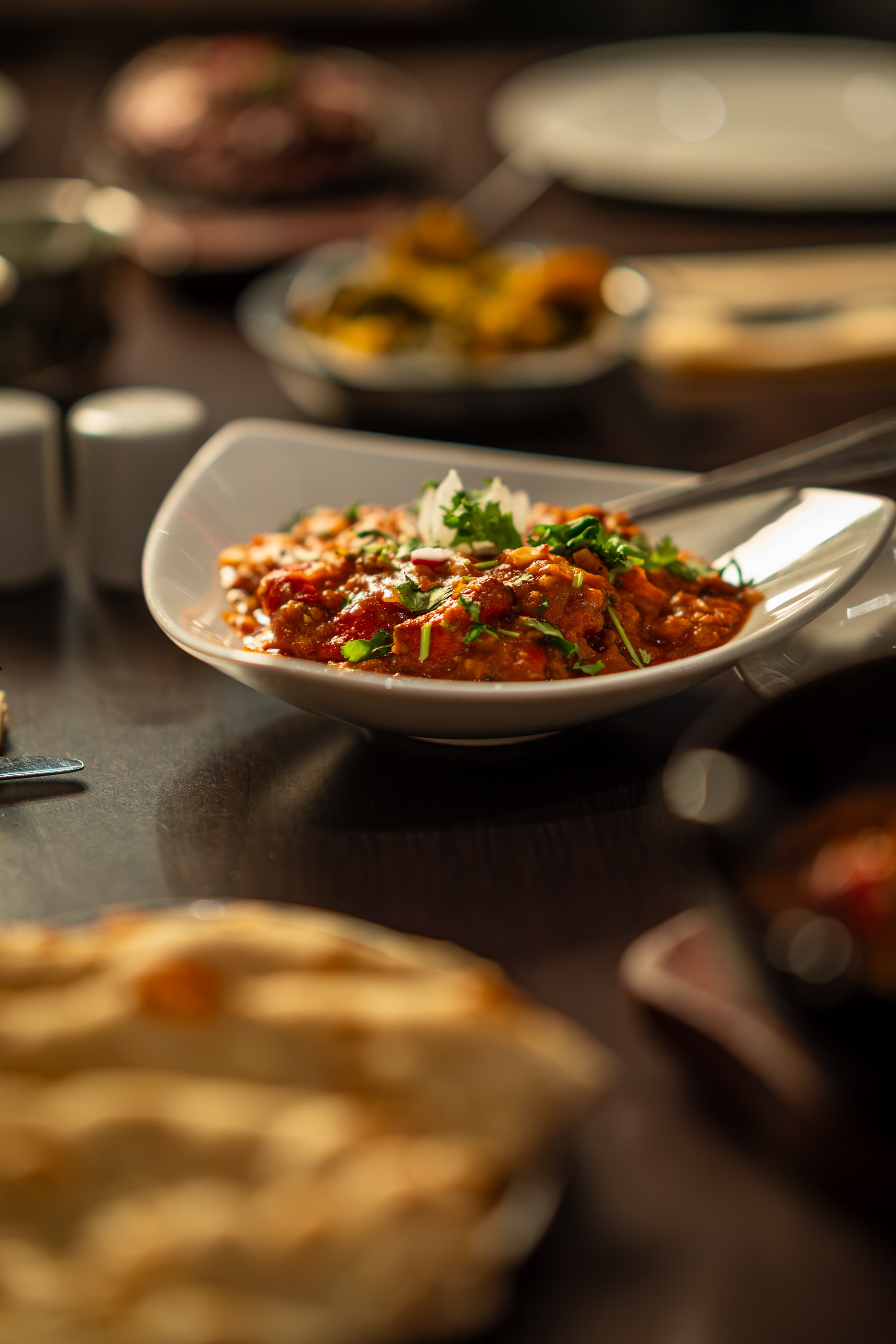 Rich curry served with naan bread