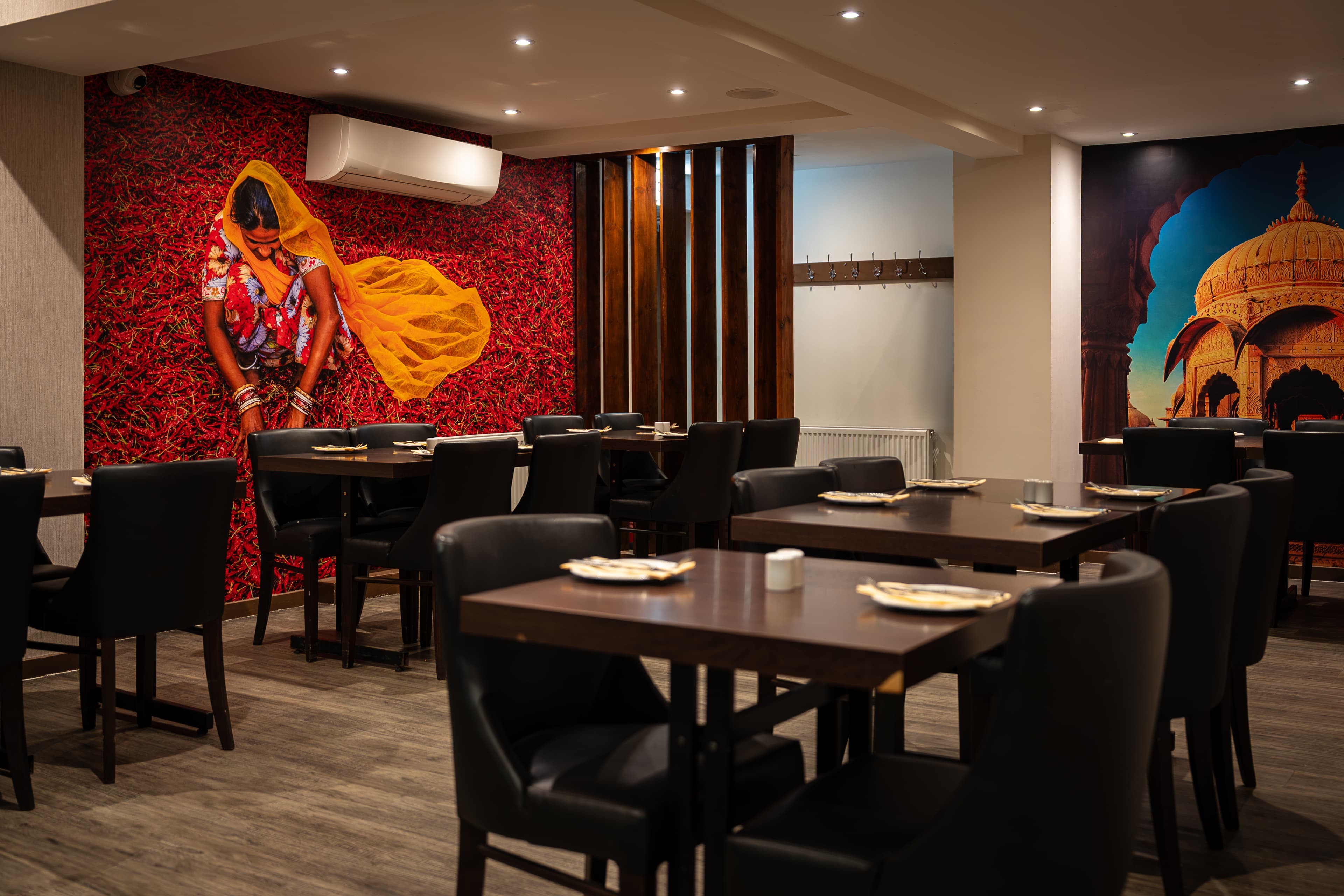 Indian Ocean dining room with chilli pepper and palace murals